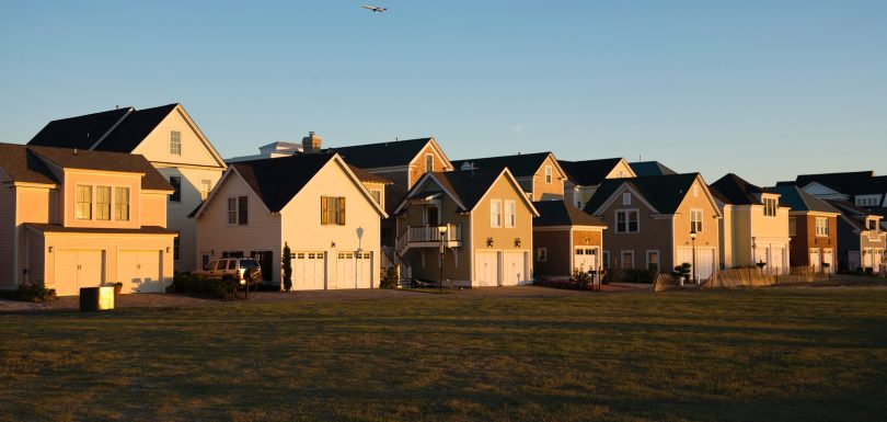Duplexes Near Grassy Field