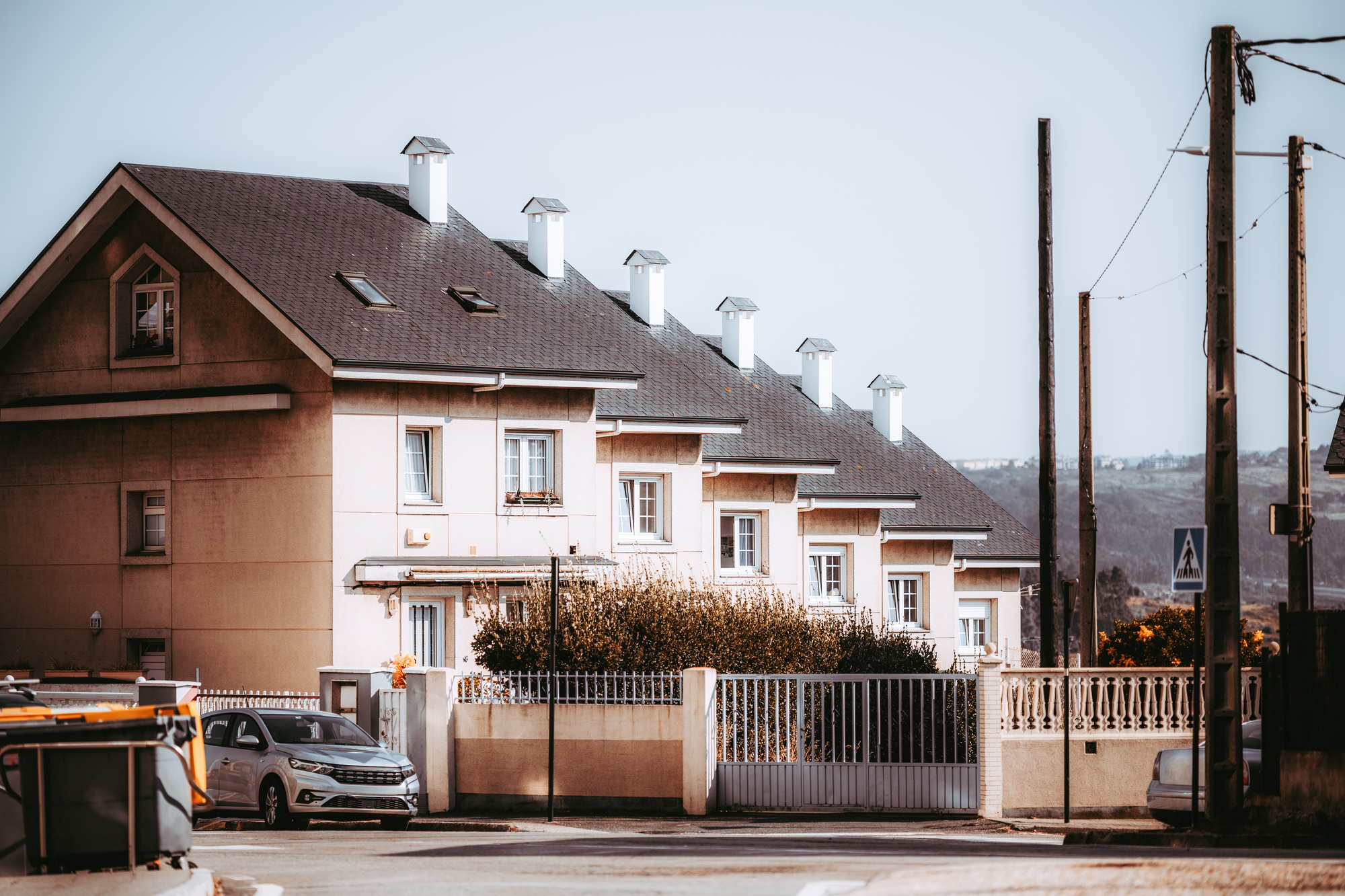 Townhouse with chimneys, gated fence
