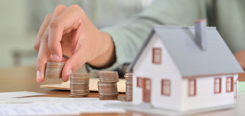 Concept of saving money to buy a house.