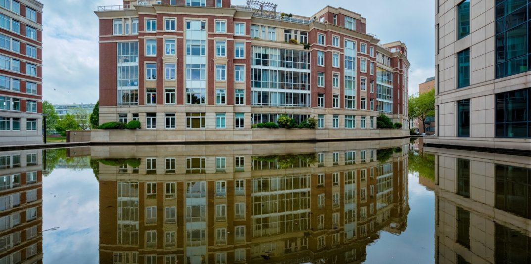Modern apartment building house with reflection