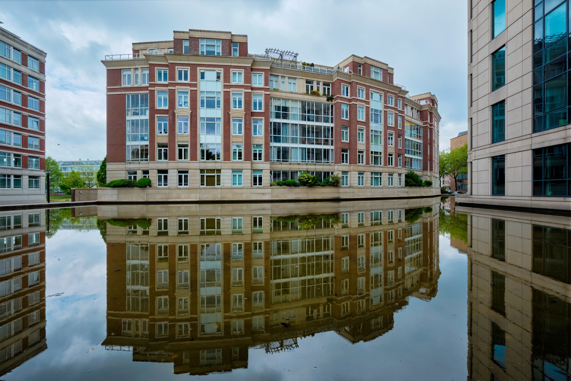 Modern apartment building house with reflection
